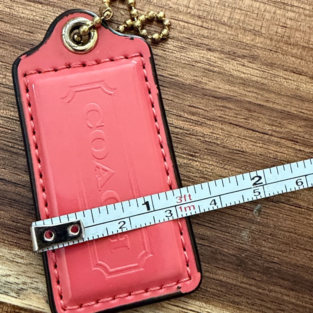 Coach Coral Leather Tag Keychain - Picture 7 of 7